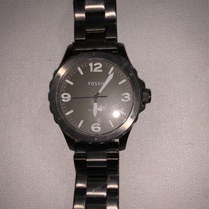 Fossil watch used to work batteries must be dead one owner